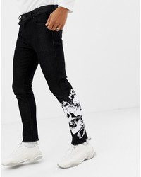 schwarze bedruckte enge Jeans von ASOS DESIGN