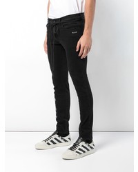 schwarze bedruckte enge Jeans von Off-White