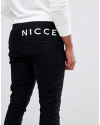 schwarze bedruckte enge Jeans von Nicce London