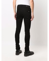 schwarze bedruckte enge Jeans von Amiri