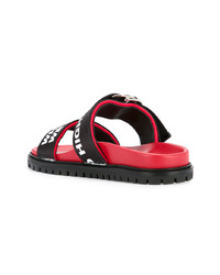 schwarze bedruckte flache Sandalen aus Leder von Joshua Sanders