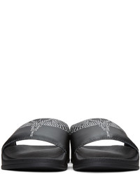 schwarze bedruckte Gummi Sandalen von Marcelo Burlon County of Milan