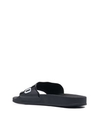 schwarze bedruckte Gummi Sandalen von Moschino