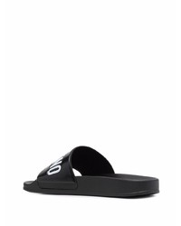 schwarze bedruckte Gummi Sandalen von Moschino