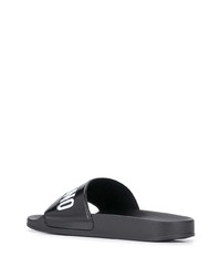 schwarze bedruckte Gummi Sandalen von Moschino