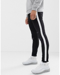 schwarze bedruckte Jeans von ASOS DESIGN