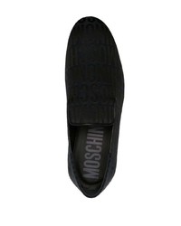 schwarze bedruckte Leder Slipper von Moschino