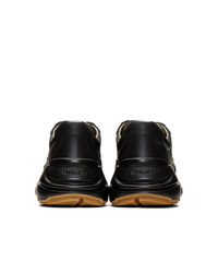 schwarze bedruckte Sportschuhe von Gucci