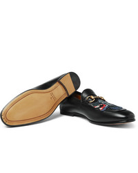 schwarze bestickte Leder Slipper von Gucci