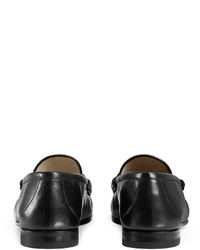 schwarze bestickte Leder Slipper von Gucci