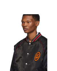 schwarze Bomberjacke von Gucci