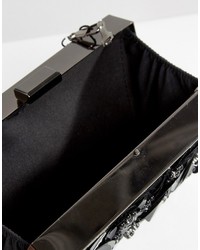 schwarze Clutch mit Blumenmuster von Boohoo