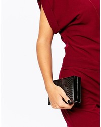 schwarze Clutch mit Schlangenmuster von Dune