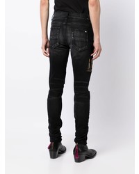 schwarze enge Jeans mit Destroyed-Effekten von Amiri