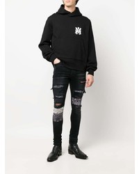 schwarze enge Jeans mit Destroyed-Effekten von Amiri