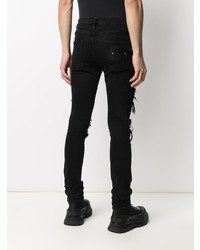 schwarze enge Jeans mit Destroyed-Effekten von Philipp Plein