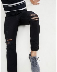 schwarze enge Jeans mit Destroyed-Effekten von Bolongaro Trevor