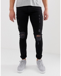 schwarze enge Jeans mit Destroyed-Effekten von Bolongaro Trevor