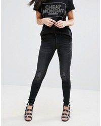 schwarze enge Jeans mit Destroyed-Effekten von Cheap Monday
