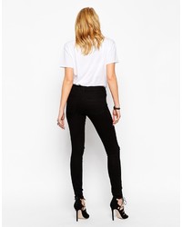 schwarze enge Jeans mit Destroyed-Effekten von Asos