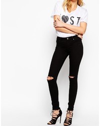 schwarze enge Jeans mit Destroyed-Effekten von Asos