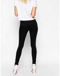 schwarze enge Jeans mit Destroyed-Effekten von Asos