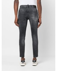 schwarze enge Jeans mit Destroyed-Effekten von DSQUARED2