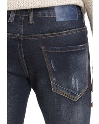 schwarze enge Jeans mit Destroyed-Effekten von Crosshatch