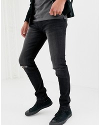 schwarze enge Jeans mit Destroyed-Effekten von D-struct