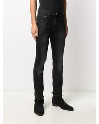 schwarze enge Jeans mit Destroyed-Effekten von Les Hommes