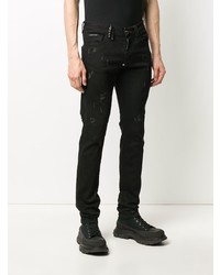 schwarze enge Jeans mit Destroyed-Effekten von Philipp Plein