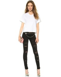 schwarze enge Jeans mit Destroyed-Effekten von Blank