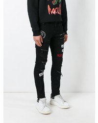 schwarze enge Jeans mit Destroyed-Effekten von Haculla