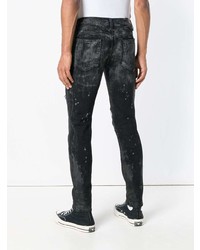 schwarze enge Jeans mit Destroyed-Effekten von Overcome