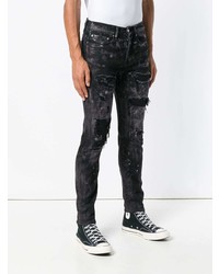 schwarze enge Jeans mit Destroyed-Effekten von Overcome