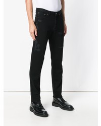 schwarze enge Jeans mit Destroyed-Effekten von Givenchy