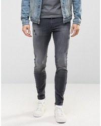 schwarze enge Jeans mit Destroyed-Effekten von Diesel