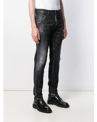 schwarze enge Jeans mit Destroyed-Effekten von DSQUARED2