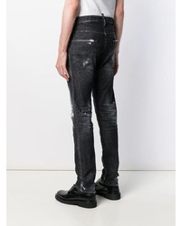 schwarze enge Jeans mit Destroyed-Effekten von DSQUARED2