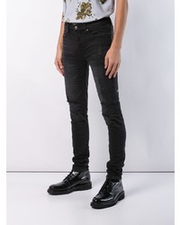 schwarze enge Jeans mit Destroyed-Effekten von Ksubi