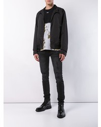 schwarze enge Jeans mit Destroyed-Effekten von Ksubi