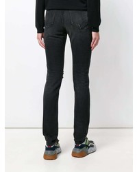schwarze enge Jeans mit Destroyed-Effekten von Marcelo Burlon County of Milan