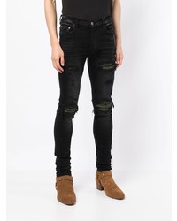 schwarze enge Jeans mit Destroyed-Effekten von Amiri