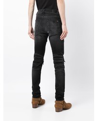 schwarze enge Jeans mit Destroyed-Effekten von Amiri