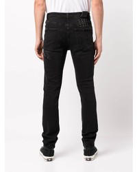 schwarze enge Jeans mit Destroyed-Effekten von Ksubi