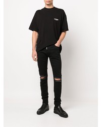 schwarze enge Jeans mit Destroyed-Effekten von Represent