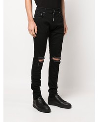 schwarze enge Jeans mit Destroyed-Effekten von Represent