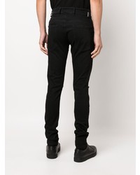 schwarze enge Jeans mit Destroyed-Effekten von Represent