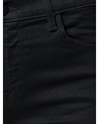 schwarze enge Jeans mit Destroyed-Effekten von J Brand
