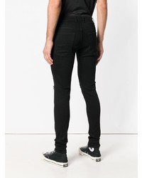 schwarze enge Jeans mit Destroyed-Effekten von Represent